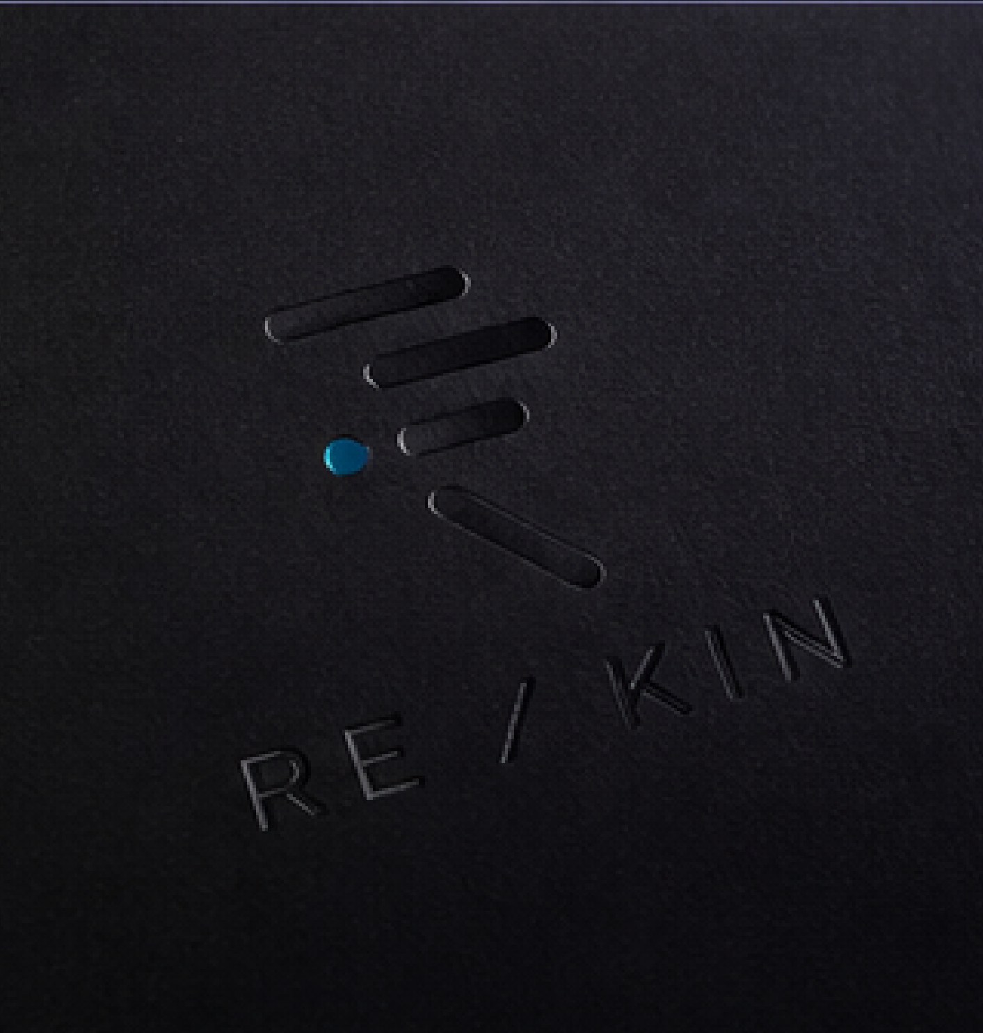 Close-up of the debossed Re/Kin logo
